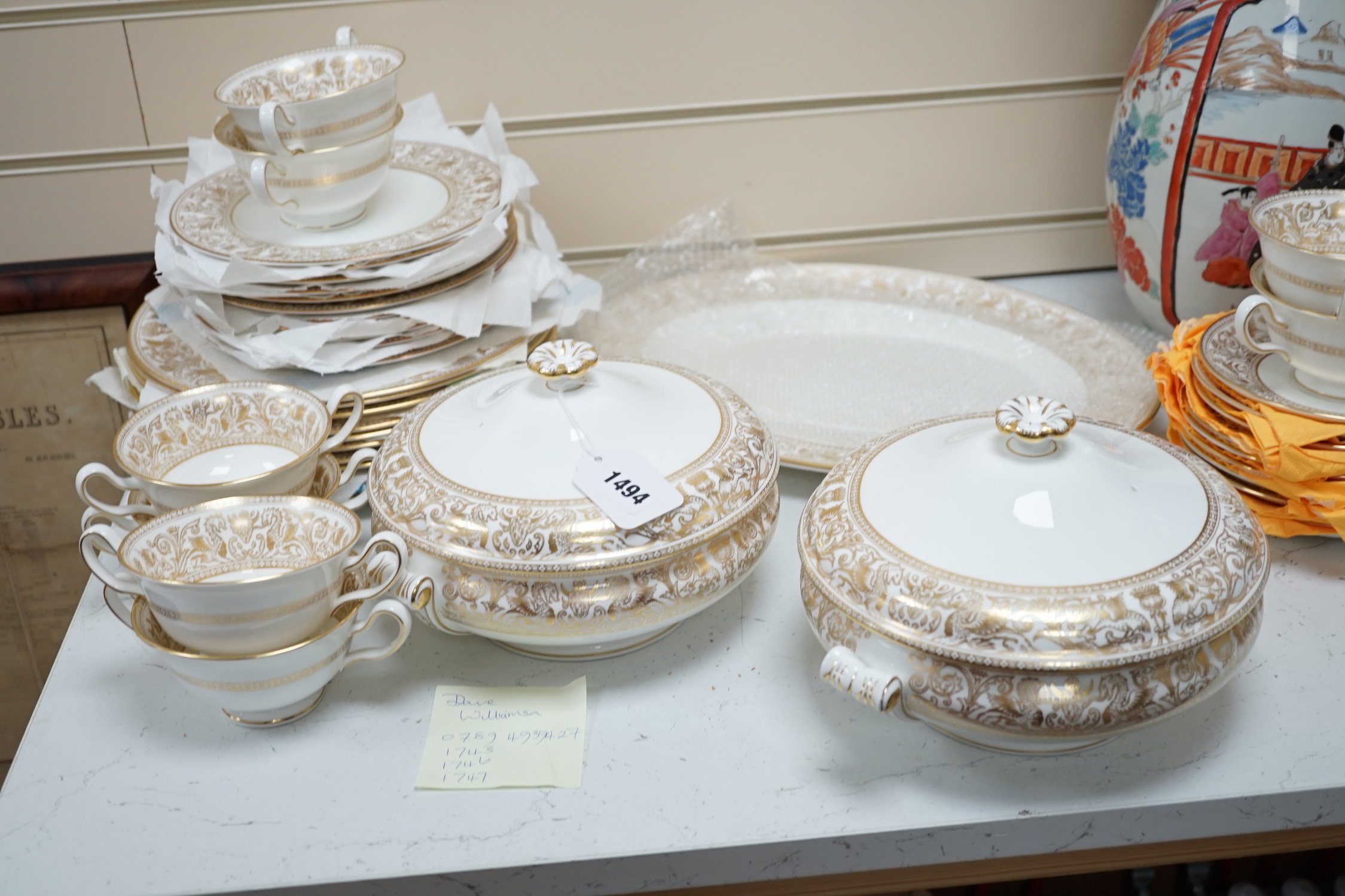 A Wedgwood Gold Florentine dinner and coffee service, mostly 8-12 settings, largest 39cm wide
